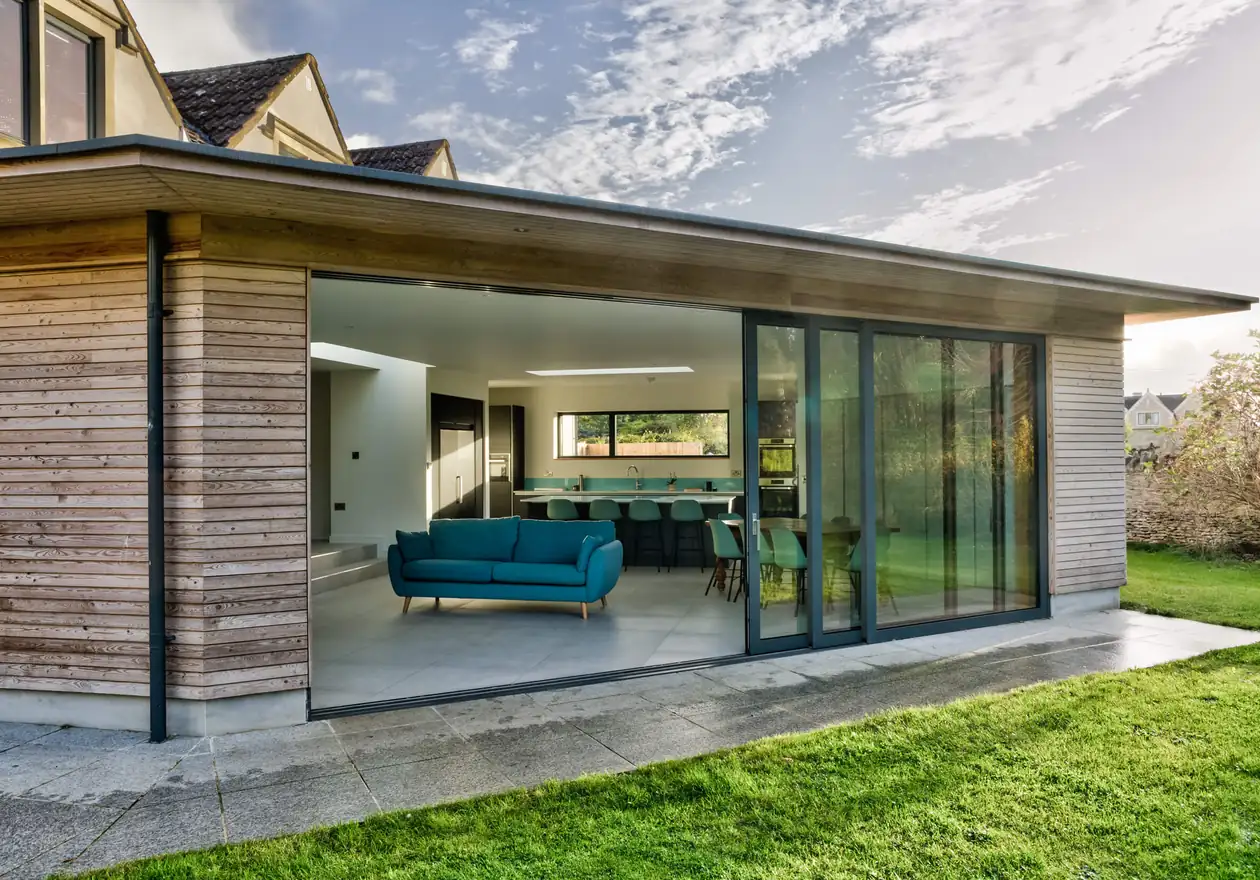 Manor Farm single-storey kitchen extension with skylights and bifold doors opening to garden
